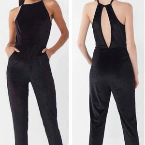 NWT UO Naomi black Velvet jumpsuit medium. Pockets party holiday